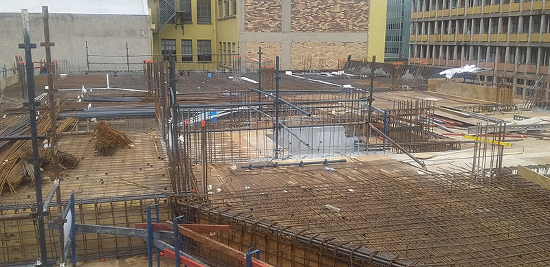 Reinforced concrete slab and rebar columns under construction at the 85 Anderson Street tower in Johannesburg CBD